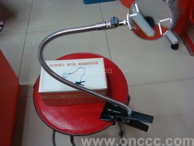 Telescopic magnifier, bench magnifier