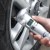 Multi-purpose four-in-one safety hammer tire gauge/cutting knife/torch/life hammer tire gauge