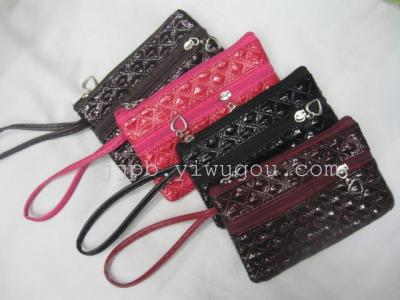 Black diamond pattern double zipper mobile phone bag made of high quality PVC material.