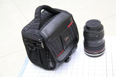 SLR camera with long focus camera with single shoulder camera bag