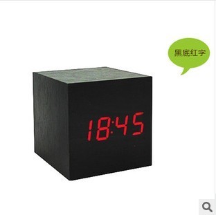 Authentic sound controlled wooden clock, express it in student.mute small alarm clock creative bedroom bedside page - turning the clock