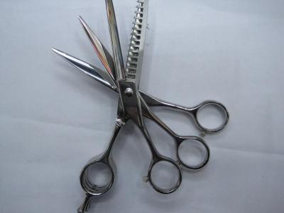 Scissors and scissors for hairdressing.