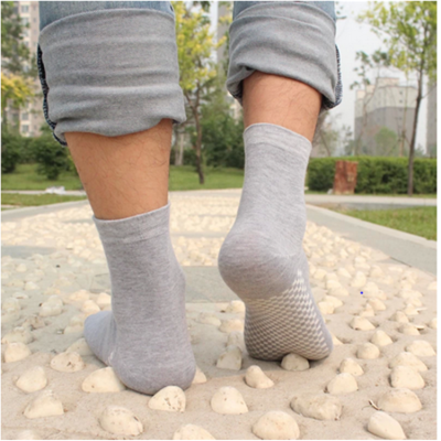 Yiwu pure cotton socks wholesale and thickened massage bottom health business men's socks trade cotton socks.