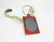 Red paint with black chip key chain