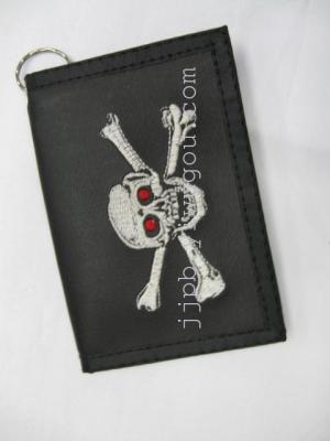 Embroidery wallet 600D black PVC waterproof material production.