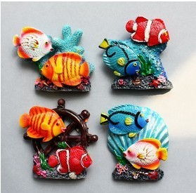 Mediterranean style resin refrigerator with tropical fish.