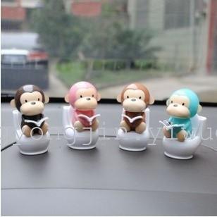 The little monkey BOBBLEHEAD DOLL toilet solar sun flower color 4