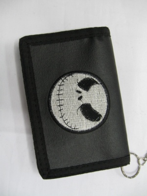 Piece embroidered wallet black waterproof PVC material production.