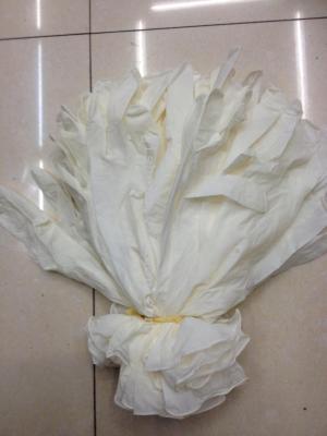A disposable 12-inch white tin latex gloves.