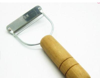 Wooden handle, pull parts relate stainless steel pull parts relate fruit and vegetable skin planer peeling knife 2 yuan store daily provisions