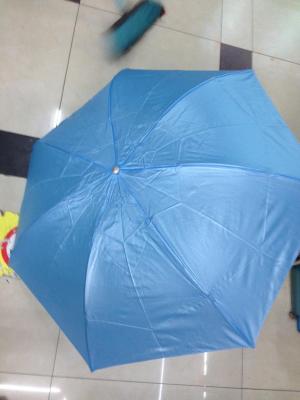Three umbrellas, advertising umbrellas