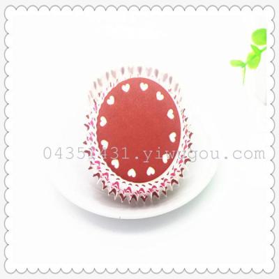 Baking tin for cupcakes with white dots on red background