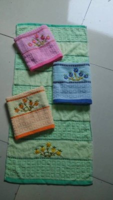 Cut small embroidered bath towel