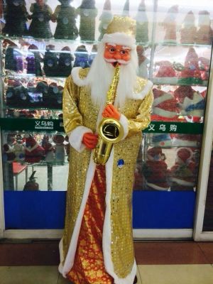 91231.8 meters Santa Claus wears a gold robe shawl to blow Sax dancing Christmas decorations