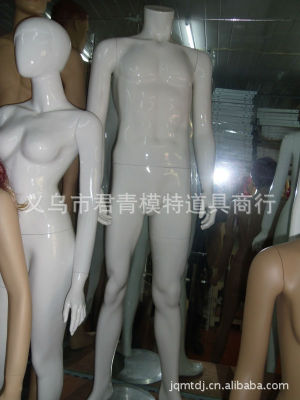 Bright white headless male mannequin, green glass fiber material, send floor mats