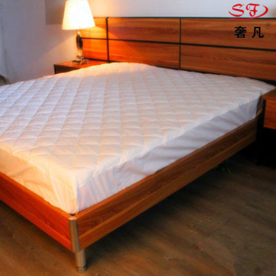 Luxury hotel where Simmons mattress with mattress protector fitted sheet set bed Mikasa skid bed set