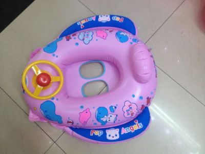 Children's inflatable toy steering wheel boat on the water with a trumpet