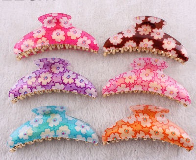 Korean version of the popular high-grade acrylic chrysanthemum shape 11 cm gold grip chuck hair accessories