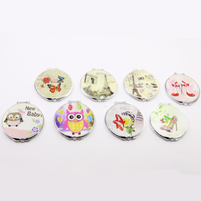 Double-sided folding pocket mirror cartoon multi-picture mirror.