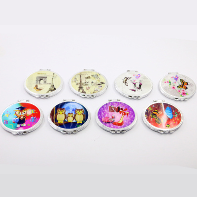 Double-sided folding cartoon multi-pattern mirror with small mirrors.