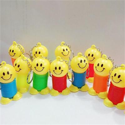 Color smiling face spring key ring