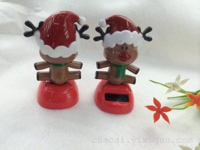 The car color solar Christmas doll swing interior decorations factory direct sunlight swing