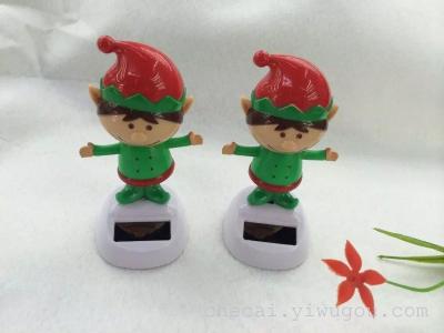 The car color swing solar Green Man Doll interior decorations factory direct sunlight swing
