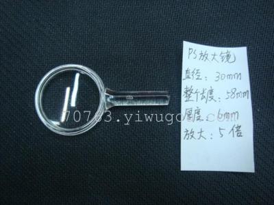 Magnifying glass and plastic magnifying glass, a transparent SD649