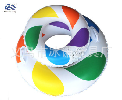 Inflatable toy fluorescent circle circle of children swimming in the circle of adults with the handle of the life circle