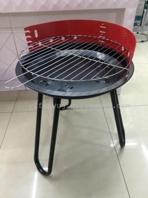 A mini BBQ grill rack outdoor portable tripod legs