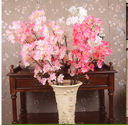 The high branches of cherry flowers on Home Furnishing engineering simulation of high decorative flower