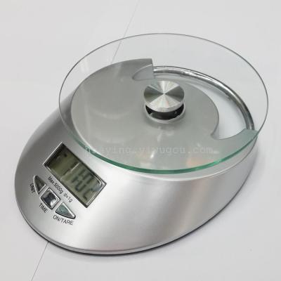 Electronic kitchen with clock weighing scale