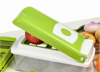 Kitchen gadget multi - function tool 12 - piece vegetable cutter.