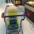 Supermarket shopping cart selling the new car's children