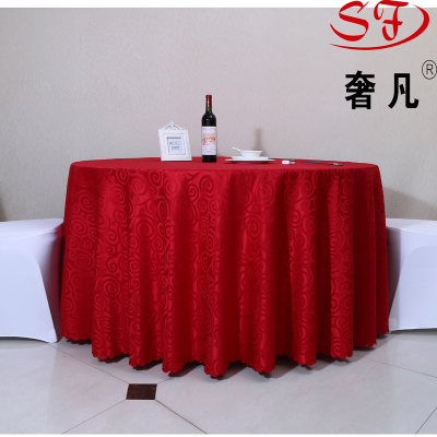 The hotel restaurant serves a round tablecloth tablecloth with full polyester luxury restaurant.