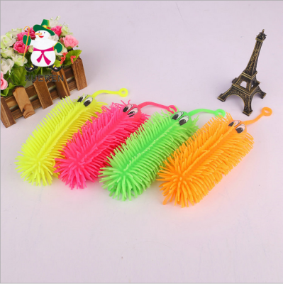 Factory wholesale 18 cm draw eyes flash caterpillar TPR soft fur ball inflatable plastic toys