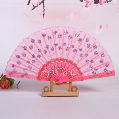 Factory direct Chinese wind dance fan Chun color bar sequined peacock fan