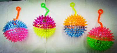 8.5 two-color massage ball, flash toy. Make a sound, bring a rope TPR toy