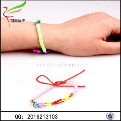 Hand woven transfer bracelet made up of five colorful rope