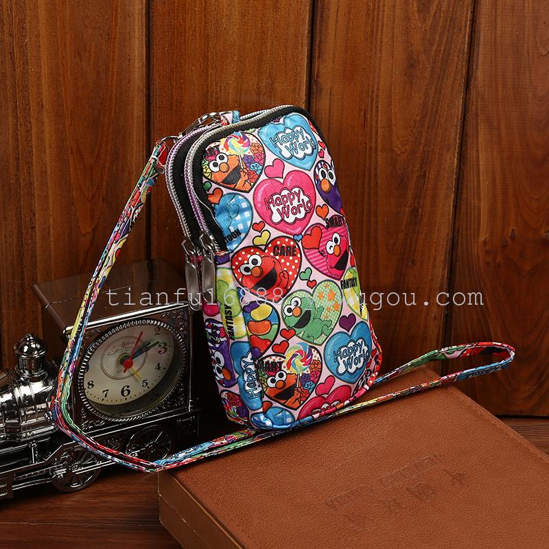 厂家直销 时尚韩版女士手机报 创意彩色印花牛津尼龙钱包手拿包