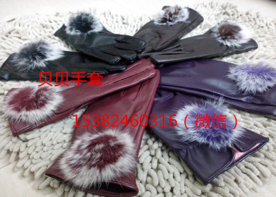 Winter women 's rabbit hair ball PU gloves warm plus cashmere riding a short gloves factory direct