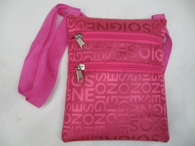 A vertical square strap bag is made of high quality thick passport color letters jacquard material production.