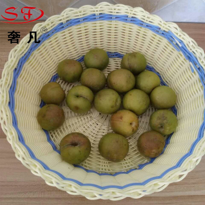 All plastic woven rattan and oval fruit storage basket containing basket basket