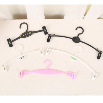 Different sizes of bra straps with bra straps.
