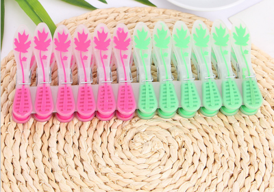 12 leaves with double color and transparent clothes to air the multi-function plastic clamp.