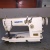 Double needle double chain sewing machine