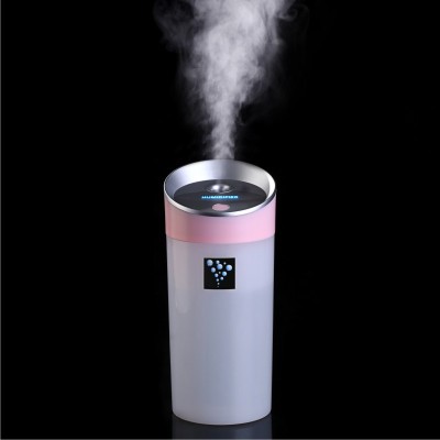A small cylindrical ultrasonic humidifier small O beauty instrument replenishment USB charging air purifier