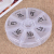 Hot-selling round 7 box suction card jewelry sorting box word medicine box travel portable storage box