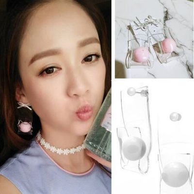 Joe Chen with a candy colored transparent acrylic beads Pink Bow Earrings
