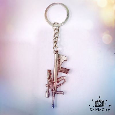 Silver alloy keychain with guns